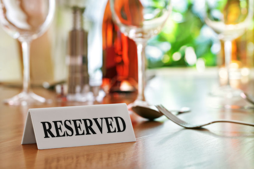 Reserved-sign-on-restaurant-table